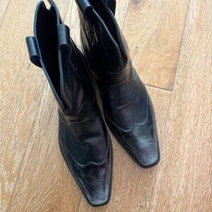 New black leather cowboy ankle boots with distressed toe detail